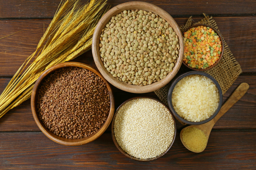 assortment of different grains - buckwheat, rice, lentils, quinoa